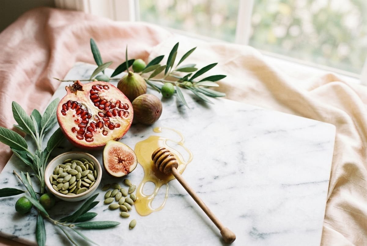 Fresh healthy foods arranged on a wooden surface